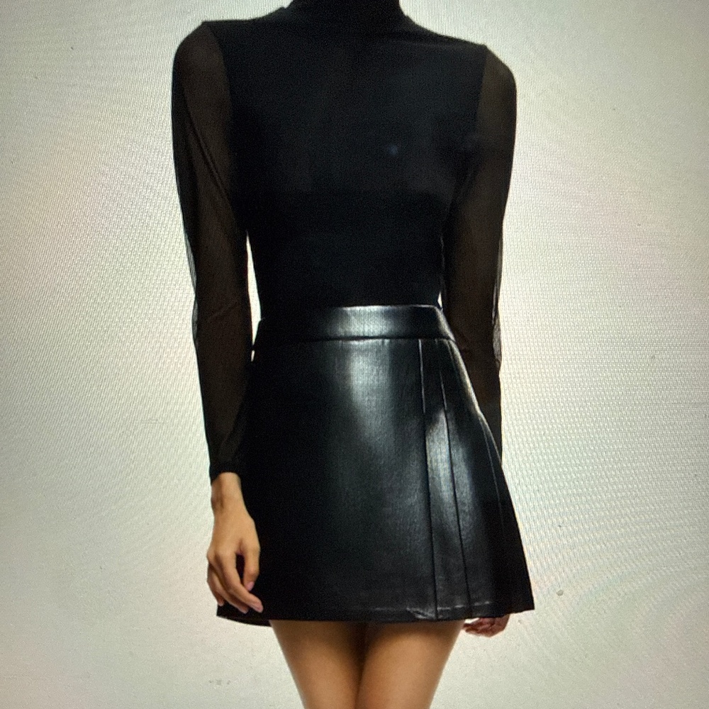 Sheer black top with leather skirt dress